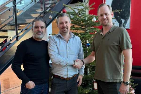 Wallenborn’s Deep Sagoo and Peter Nygaard with WFS' Jimi Daniel Hansen.